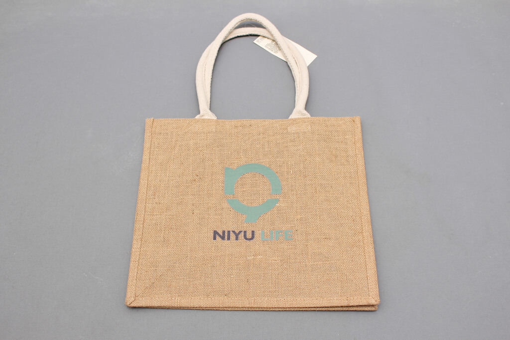 提袋:Niyu Life International的第1張圖(客製化公司制服、班服製作、團體服製作等示意或作品圖)