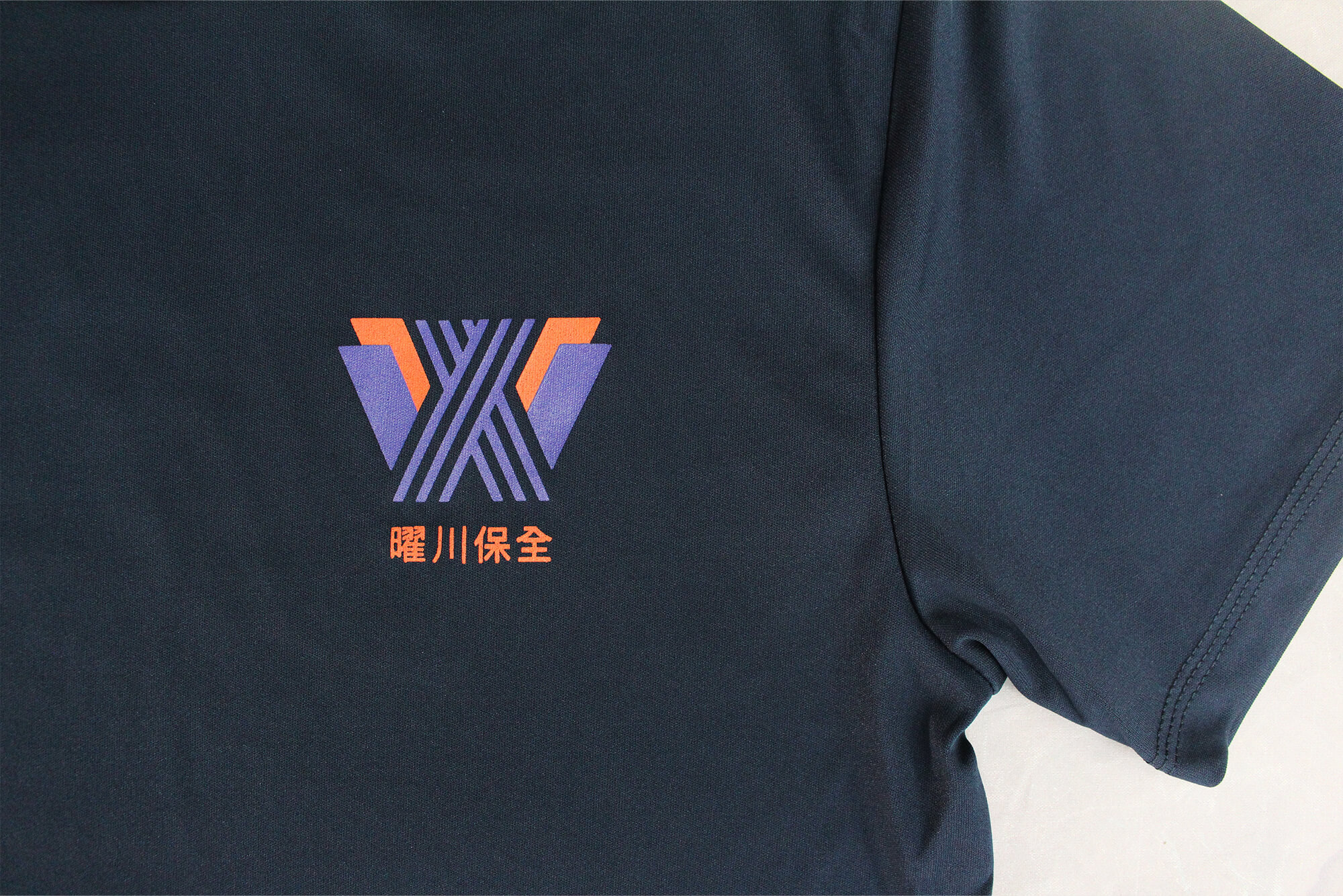 客製化排汗短袖:曜川保全的第3張圖(客製化公司制服、班服製作、團體服製作等示意或作品圖)